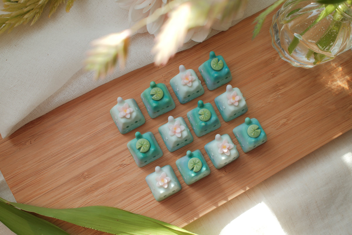 Artisan Keycaps - Soft and delicate keyboard buddies sculpted with polymer clay.