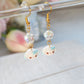 Blue Blush Bunnies Dangling Earrings