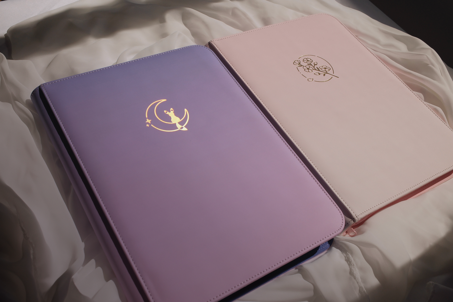 9 Pocket Card Binders - Thoughtfully designed to protect your collections. Faux leather gradient covers with minimalistic foil details. Every binder includes a surprise art print!